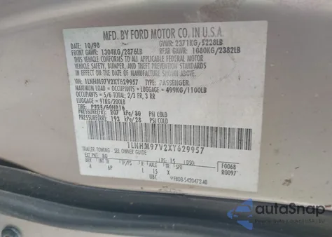 1999 Lincoln Continental из США, поврежденный, VIN 1LNHM97V2XY629957